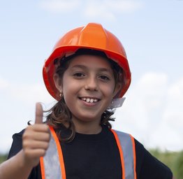 student wearing safety helmet