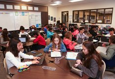 Class of students working